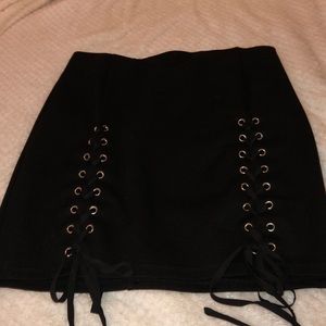 Double lace up black skirt